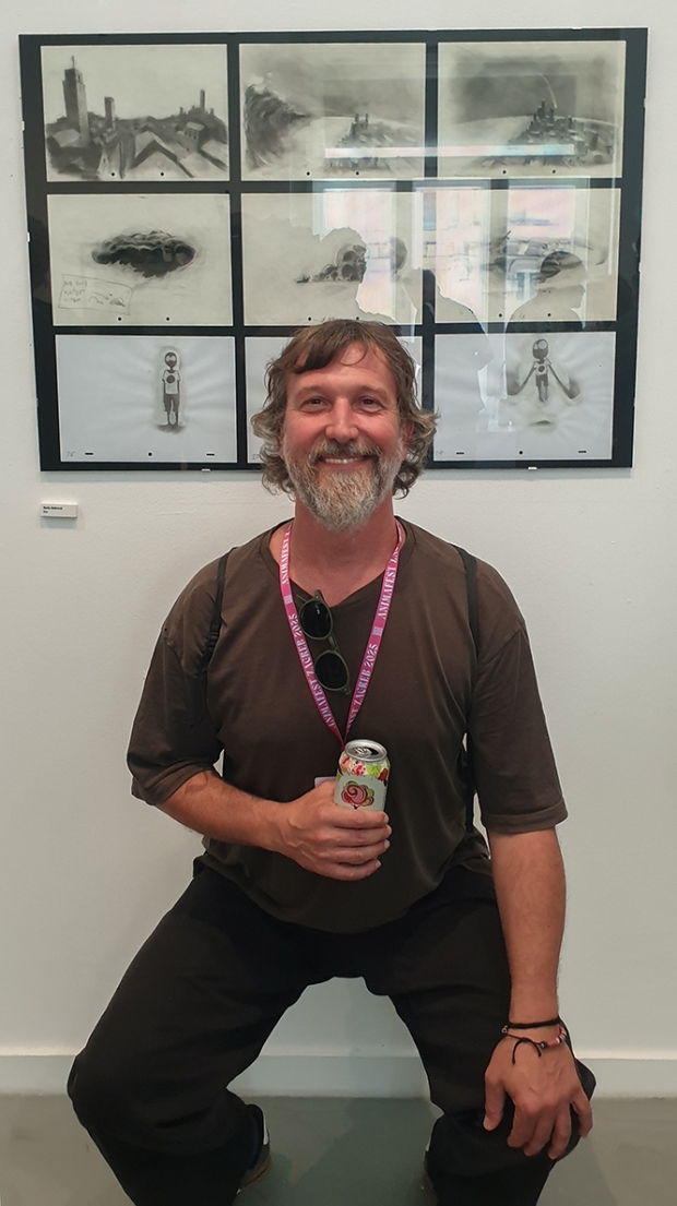 Croatian animator Marko Meštrović with charcoal drawings from his film HOW at the Behind scenes 7 opening exhibition