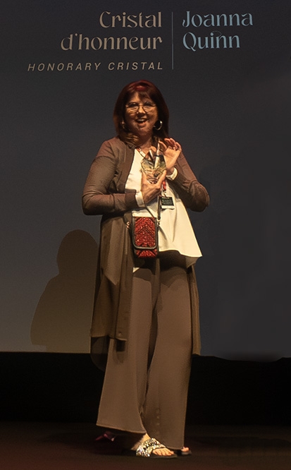 Joanna Quinn accepting her Lifetime Achievement Cristal