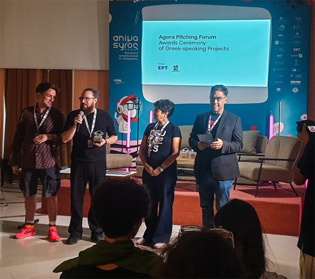 Sergio Kotsovoulos and Panos Voulgaris receiving the Greek pitching prize from Agora director Marineta-Mak Kritkou and Anima Syros president Vassilis C. Karamitsanis